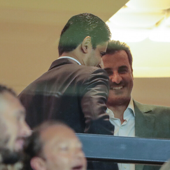 L'émir du Qatar Tamim ben Hamad Al Thani (propriétaire du PSG), David Beckham et Nasser Al-Khelaïfi, Président-Directeur général du PSG dans les tribunes lors du match UEFA Ligue des Champions groupe A, opposant le Paris Saint-Germain (PSG) au Real Madrid au Parc des Princes à Paris, le 18 septembre 2019. © Stéphane Allaman/Panoramic/Bestimage