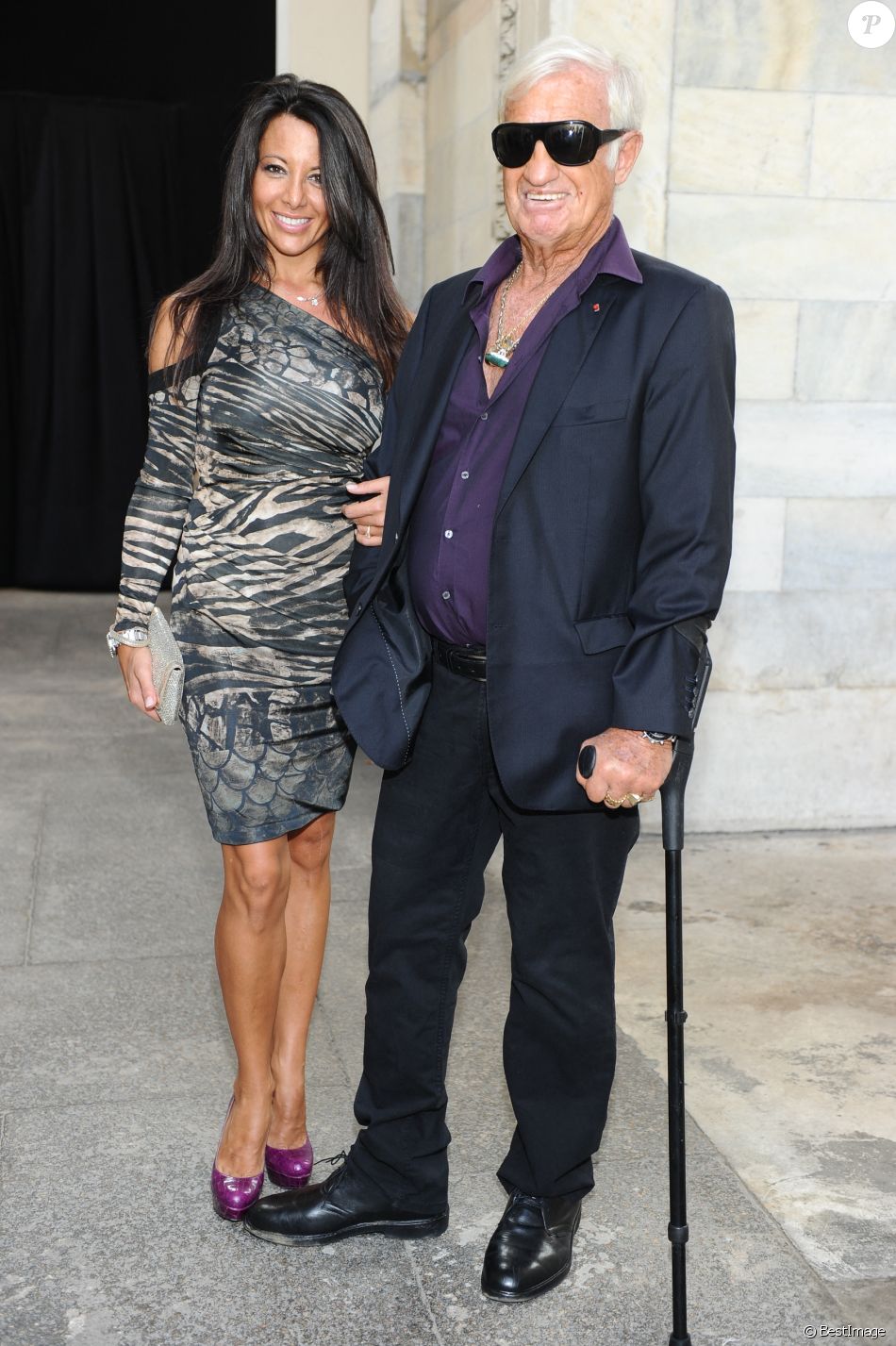 Jean-Paul Belmondo et Barbara Gandolfi - Défilé Roberto Cavalli. Le 25 septembre 2011.
