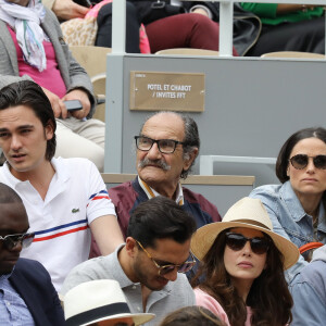 Nelson Monfort, Alain-Fabien Delon, Gérard Hernandez et Capucine Anav dans les tribunes lors des internationaux de tennis de Roland Garros à Paris, France, le 30 mai 2019. © Jacovides-Moreau/Bestimage