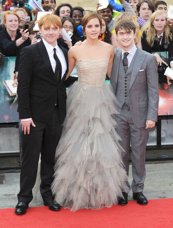 Rupert Grint, Daniel Radcliffe et Emma Watson à la première de Harry Potter et les reliques de la mort partie 2 à Londres, en juillet 2011