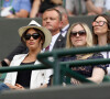 Meghan Markle, duchesse de Sussex, et son amie Lindsay Roth (à droite) au Tournoi de tennis de Wimbledon à Londres.