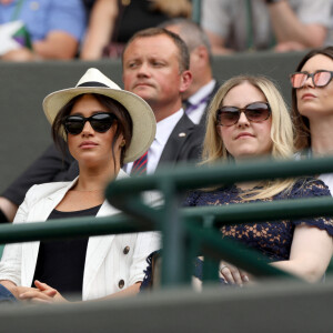 Meghan Markle, duchesse de Sussex, et son amie Lindsay Roth (à droite) au Tournoi de tennis de Wimbledon à Londres.