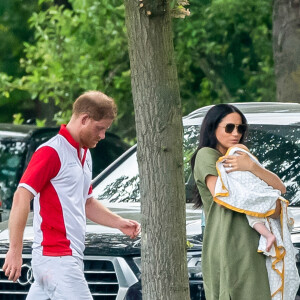 Le prince Harry, duc de Sussex, Meghan Markle, duchesse de Sussex et leur fils Archie Harrison Mountbatten-Windsor lors d'un match de polo de bienfaisance King Power Royal Charity Polo Day à Wokinghan, comté de Berkshire, Royaume Uni, le 10 juillet 2019.