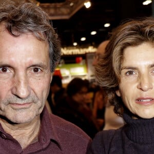 Jean-Jacques Bourdin et sa femme Anne Nivat - 38ème salon du livre de Paris à la Porte de Versailles, Paris le 17 mars 2018. © Cédric Perrin/Bestimage