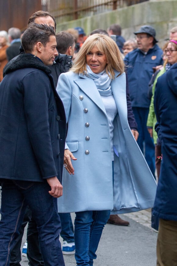 Le président Emmanuel Macron et sa femme Brigitte (accompagnés par le lieutenant Fabien) passent le week-end de la Toussaint à Honfleur le 31 octobre 2019.