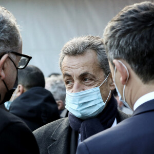 Nicolas Sarkozy, Richard Ferrand et Gérald Darmanin devant la statue La Parole portée aux Invalides. Paris, le 11 mars 2021. © Stéphane Lemouton / Bestimage