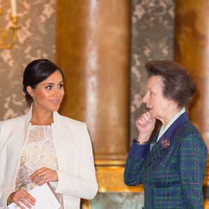 Le prince Harry, duc de Sussex, et Meghan Markle (enceinte), duchesse de Sussex, la princesse Anne - La famille royale d'Angleterre lors de la réception pour les 50 ans de l'investiture du prince de Galles au palais Buckingham à Londres. Le 5 mars 2019