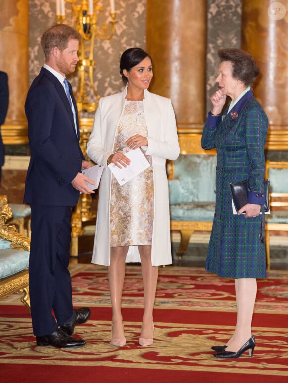 Le prince Harry, duc de Sussex, et Meghan Markle (enceinte), duchesse de Sussex, la princesse Anne - La famille royale d'Angleterre lors de la réception pour les 50 ans de l'investiture du prince de Galles au palais Buckingham à Londres. Le 5 mars 2019