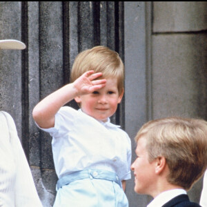 Lady Diana, le prince Harry et la princesse Anne lors de la parade Trooping the Colour en 1987 au palais de Buckingham.