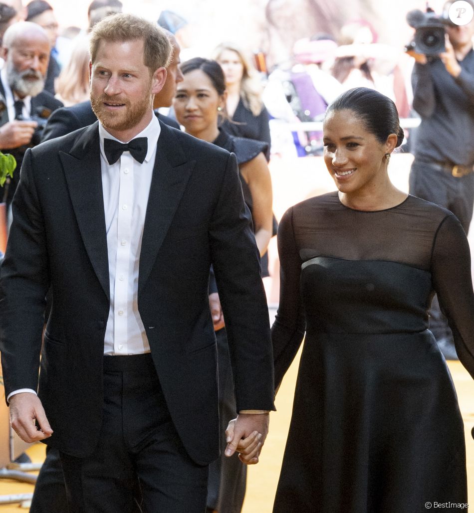 Le prince Harry, duc de Sussex, et Meghan Markle, duchesse de Sussex, à la première du film "Le Roi Lion" au cinéma Odeon Luxe Leicester Square à Londres, le 14 juillet 2019.