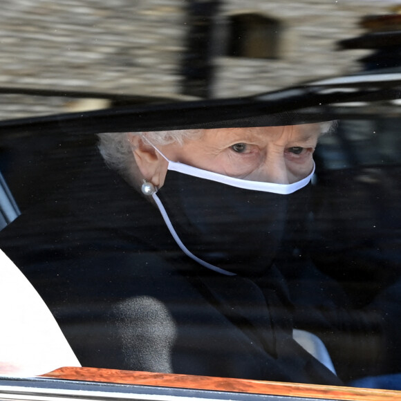 La reine Elizabeth II lors des obsèques du prince Philip en la chapelle Saint-Georges de Windsor le 17 avril 2021. Photo by Jonathan Brady/PA Wire/ABACAPRESS.COM