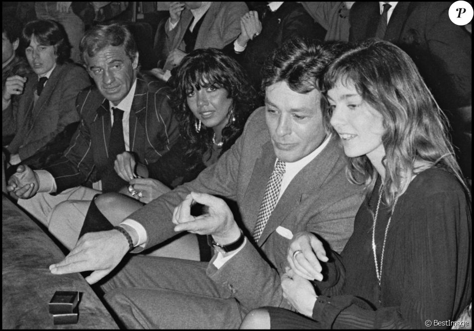 Alain Delon, Anne Parillaud, Jean-Paul Belmondo et Carlos Sotto Mayor à Paris en 1983.