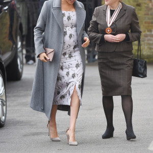 Meghan Markle, duchesse de Sussex, (enceinte de son fils Archie), visite le foyer Royal Variety de "Brinsworth House", à Twickenham le 18 décembre 2018.