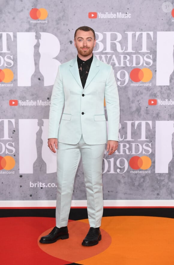 Sam Smith au photocall de la cérémonie des Brit Awards à l'O2 Arena à Londres.