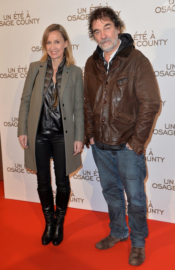 Olivier Marchal et sa femme Catherine - Avant-première du film "Un été à Osage County" à l'UGC Normandie à Paris, le 13 février 2014.