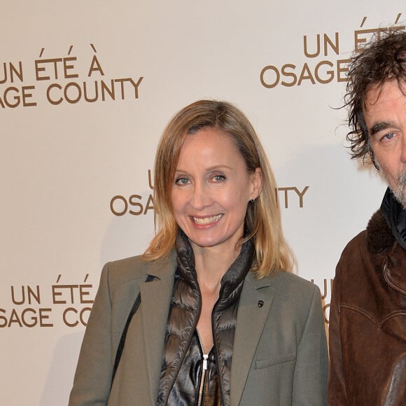 Olivier Marchal et sa femme Catherine - Avant-première du film "Un été à Osage County" à l'UGC Normandie à Paris, le 13 février 2014.