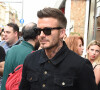 David Beckham et son fils Romeo lors d'une sortie père fils à Milan le 19 juin 2019.