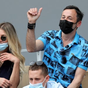 Michaël Cohen et sa compagne dans les tribunes lors des internationaux de France de Tennis de Roland Garros 2021 à Paris, le 6 juin 2021. © Dominique Jacovides/Bestimage