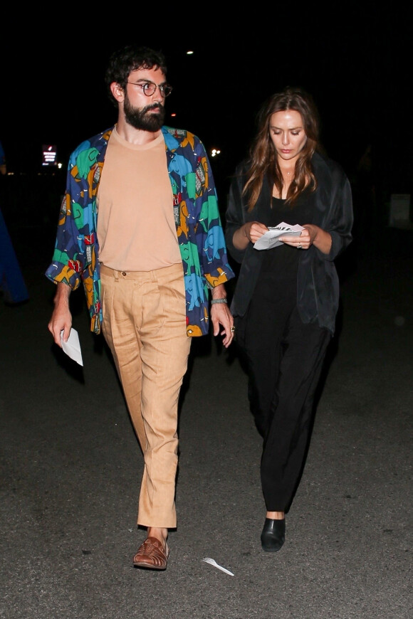 Robbie Arnett et sa fiancée Elizabeth Olsen sont allés assister au concert des Rolling Stones à Pasadena, Los Angeles, le 22 août 2019.