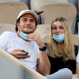 Amir et sa femme Lital dans les tribunes des Internationaux de France de Tennis de Roland Garros à Paris. © Dominique Jacovides / Bestimage