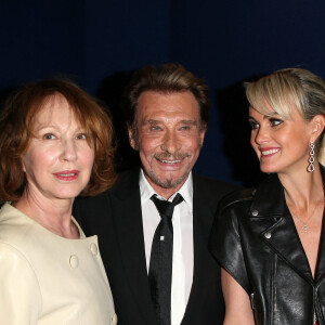 Nathalie Baye, Johnny Hallyday et sa femme Laeticia - Avant-première de 'Salaud on t'aime' à l'UGC Normandie sur les Champs-Elysées à Paris le 31 mars 2014.