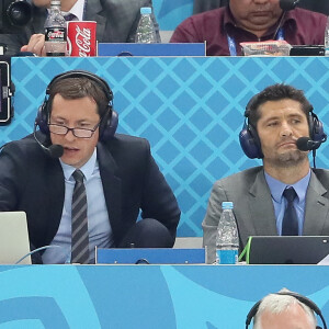 Les commentateurs Bixente Lizarazu et Grégoire Margotton lors de la 8ème de finale du match de coupe du monde opposant l'Angleterre à la Colombie au stade Spartak à Moscow, Russie. L'Angleterre a gagné le match 4-3 aux tirs au but après un match nul 1-1. © Cyril Moreau/Bestimage