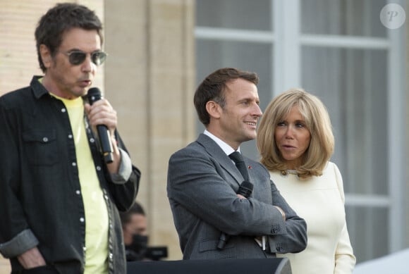 Emmanuel Macron, sa femme Brigitte Macron et Jean-Michel Jarre - Fête de la musique 2021 au palais de l'Elysée à Paris. © Eliot Blondet/Pool/Bestimage