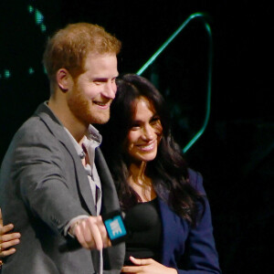 Le prince Harry, duc de Sussex, et Meghan Markle, duchesse de Sussex, enceinte, lors de l'évènement WE Day au Wembley Arena à Londres, Royaume Uni, le 6 mars 2019.