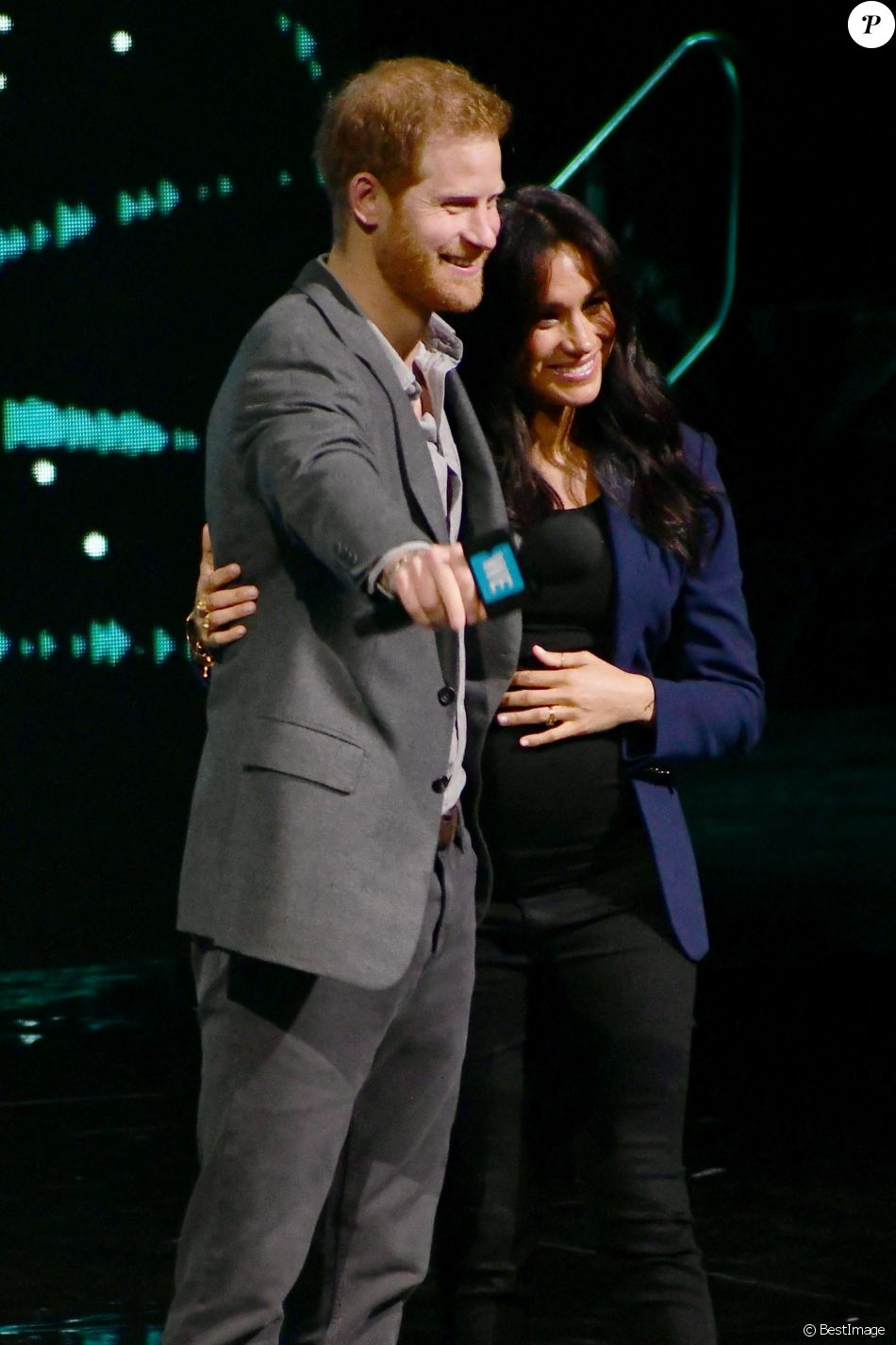 Le prince Harry, duc de Sussex, et Meghan Markle, duchesse de Sussex, enceinte, lors de l'évènement WE Day au Wembley Arena à Londres, Royaume Uni, le 6 mars 2019.