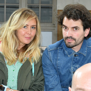 Enora Malagré et son compagnon Hugo assistent au défilé Off-White™, collection automne-hiver 2021/2022 (baptisée "Laboratory Of Fun") au Lycée Carnot à Paris, le 4 juillet 2021. © Veeren/Bestimage