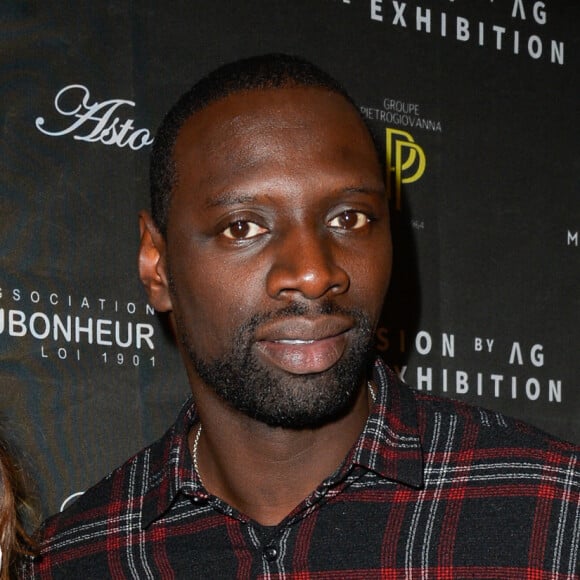 Omar Sy et sa femme Hélène au vernissage de l'exposition "Vision by AG", au profit de l'association caritative CeKeDuBonheur, à la Piscine Molitor à Paris, le 30 novembre 2016. © Guirec Coadic/Bestimage