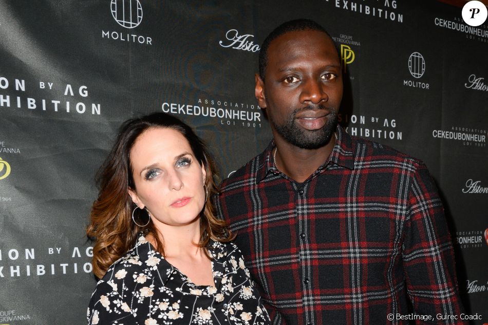 Omar Sy et sa femme Hélène au vernissage de l'exposition "Vision by AG", au profit de l'association caritative CeKeDuBonheur, à la Piscine Molitor à Paris, le 30 novembre 2016. © Guirec Coadic/Bestimage