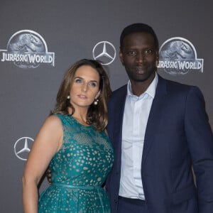 Omar Sy et sa femme Hélène Sy (boucles d'oreilles Messika) - Première du film "Jurassic World" à l'Ugc Normandie à Paris le 29 mai 2015.