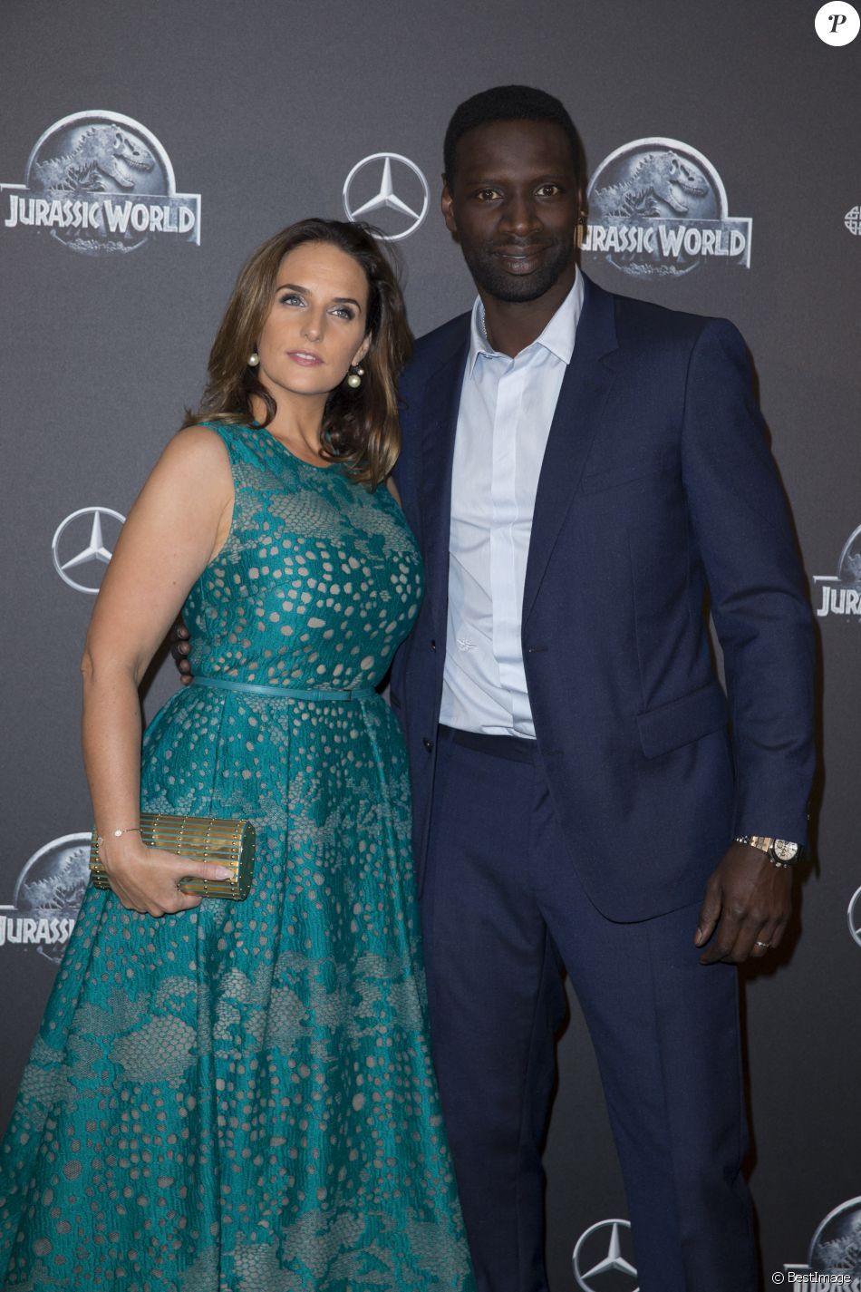 Omar Sy et sa femme Hélène Sy (boucles d'oreilles Messika) - Première du film "Jurassic World" à l'Ugc Normandie à Paris le 29 mai 2015.