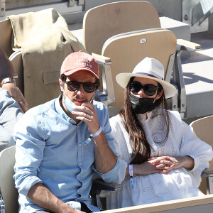 Vianney et sa compagne Catherine Robert (enceinte) dans les tribunes lors de la finale des internationaux de France Roland Garros à Paris le 13 juin 2021. © Dominique Jacovides / Bestimage