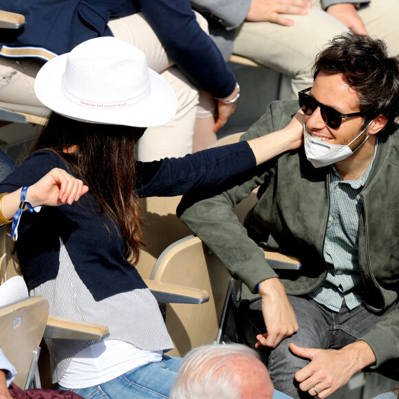 Vianney (Vianney Bureau) et sa compagne Catherine Robert (enceinte) dans les tribunes des Internationaux de France de tennis de Roland Garros à Paris, France, le 5 juin 2021. © Dominique Jacovides/Bestimage