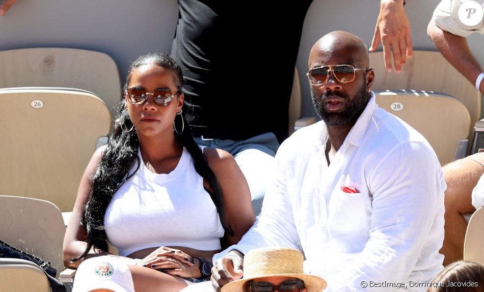 Teddy Riner et sa femme Luthna Plocus dans les tribunes lors de la finale hommes des Internationaux de France de tennis de Roland Garros à Paris le 13 juin 2021. © Dominique Jacovides / Bestimage