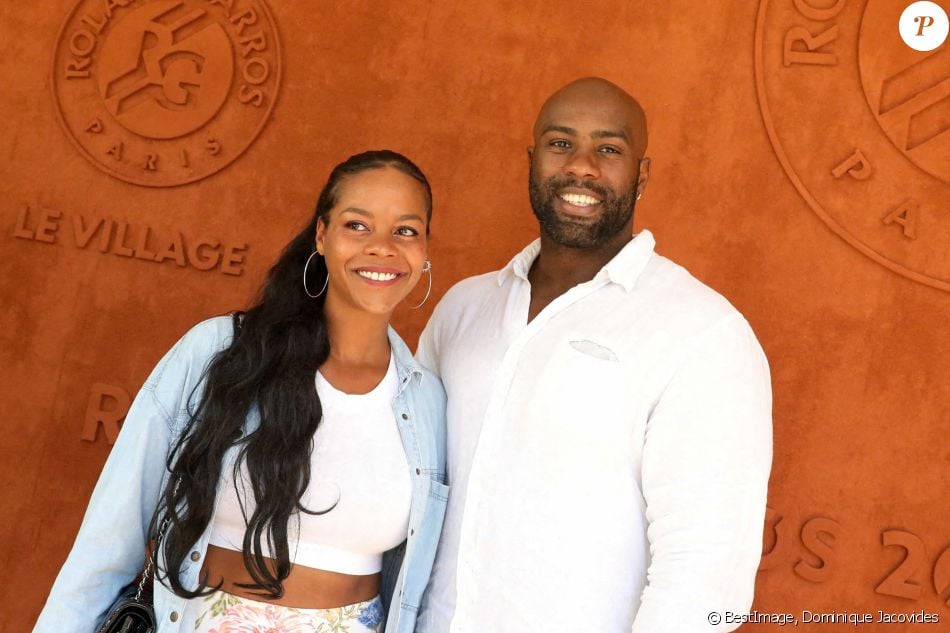 Teddy Riner et sa femme Luthna Plocus au village lors des internationaux de France Roland Garros à Paris le 13 juin 2021. © Dominique Jacovides / Bestimage