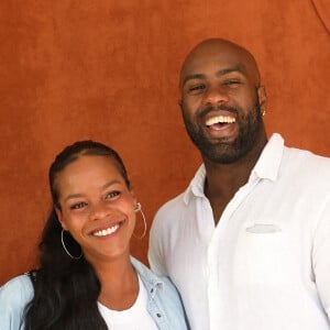 Teddy Riner et sa femme Luthna Plocus au village lors des internationaux de France Roland Garros à Paris le 13 juin 2021. © Dominique Jacovides / Bestimage