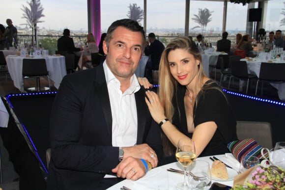 Exclusif - Arnaud Ducret et sa femme Claire Francisci - Le Grand Dîner du 14 juillet, sur le rooftop de l'hôtel Pullman Tour Eiffel à Paris, France, le 14 juillet 2021. © Philippe Baldini/Bestimage