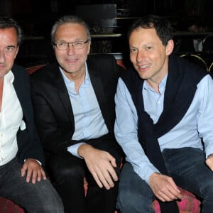 Christophe Dechavanne , Laurent Ruquier et Marc-Olivier Fogiel - Soirée de lancement du livre "Radiographie" de Laurent Ruquier au Buddha-Bar à Paris, le 16 juin 2014.