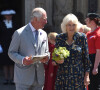 Le prince Charles, prince de Galles, et Camilla Parker Bowles, duchesse de Cornouailles, quittent la cathédrale d'Exeter, le 19 juillet 2021.