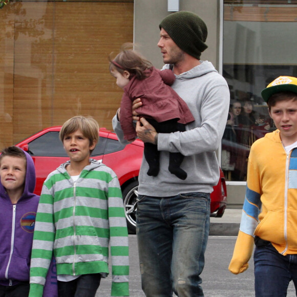 David, Victoria Beckham et leurs enfants Brooklyn, Romeo, Cruz et Harper en mars 2012.