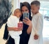Sarah, la compagne du footballeur Presnel Kimpembé, et leurs deux enfants Kahis et Kahil. Mai 2021.