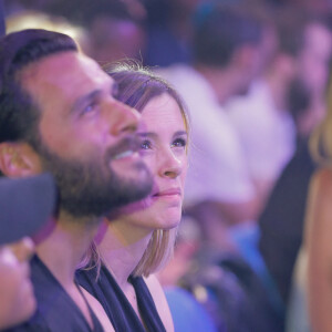 Maxim Nucci (Yodelice) et sa compagne enceinte Isabelle Ithurburu - Maxim Nucci (Yodelice) et sa compagne enceinte Isabelle Ithurburu assistent au match de boxe de Tony Yoka au palais des sports de Paris, le 23 juin 2018 © Veeren-CVS/Bestimage