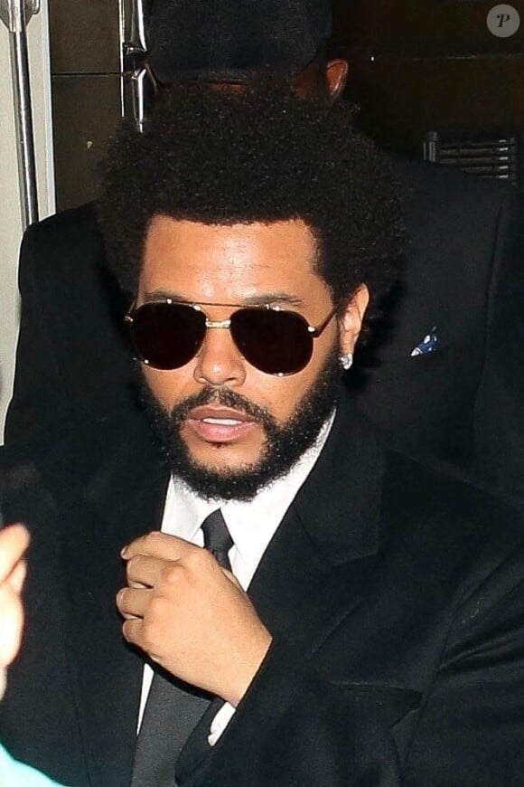 The Weeknd arrive à l'after-party de la soirée des Billboard Music Awards au restaurant The Nice Guy à West Hollywood, Los Angeles, le 23 mai 2021.