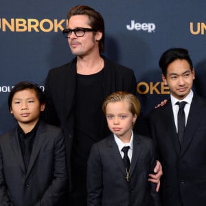 Brad Pitt, Maddox Jolie-Pitt, Pax Jolie-Pitt et Shiloh Jolie-Pitt à la première du film "Unbroken" à Hollywood, le 15 décembre 2014 