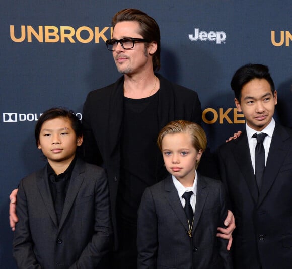 Brad Pitt, Maddox Jolie-Pitt, Pax Jolie-Pitt et Shiloh Jolie-Pitt à la première du film "Unbroken" à Hollywood, le 15 décembre 2014 