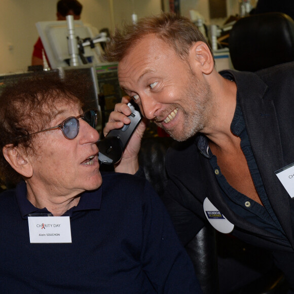 Alain Souchon et son fils Pierre - 14e édition du Charity Day dans la salle des marchés de la société de courtage Aure BGC, le 11 septembre 2018. © Veeren/Bestimage