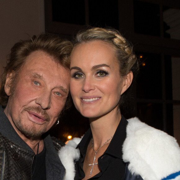 Exclusif - Prix Special - No web - No blog - Johnny Hallyday et sa femme Laeticia - Aftershow apres le concert caritatif de Johnny Hallyday pour l'association de sa femme "La Bonne Etoile", qui vient en aide aux enfants du Vietnam, au Trianon a Paris, le 15 decembre 2013.  No Web - Online pour Belgique et Suisse  